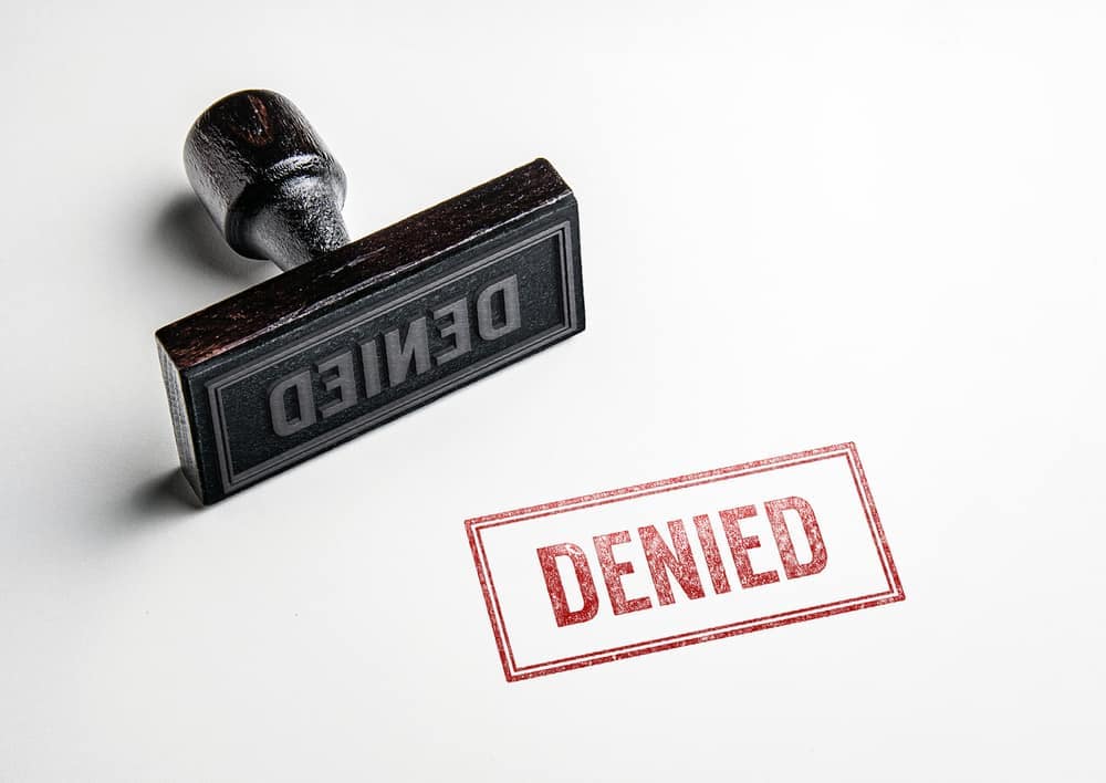 A rubber stamp with the word denied on it, for use in Conditional-Use Permit Appeals at the Washburn County Board related to Spooner Lake Campground.