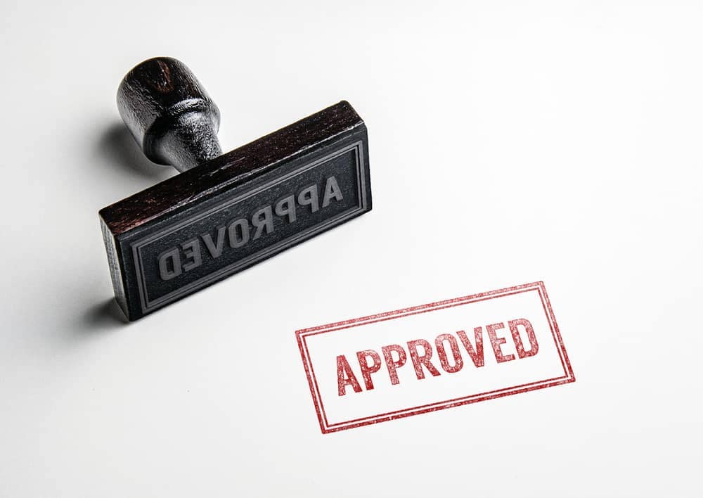 A rubber stamp with the word "approved" on it, ideal for the Trenton Planning Board when reviewing applications for a new campground.