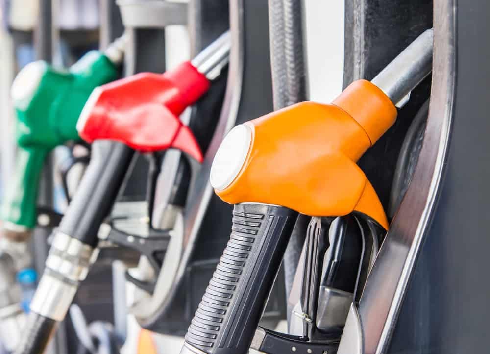 A group of fuel pumps at a gas station, catering to drivers and their gas demand needs.