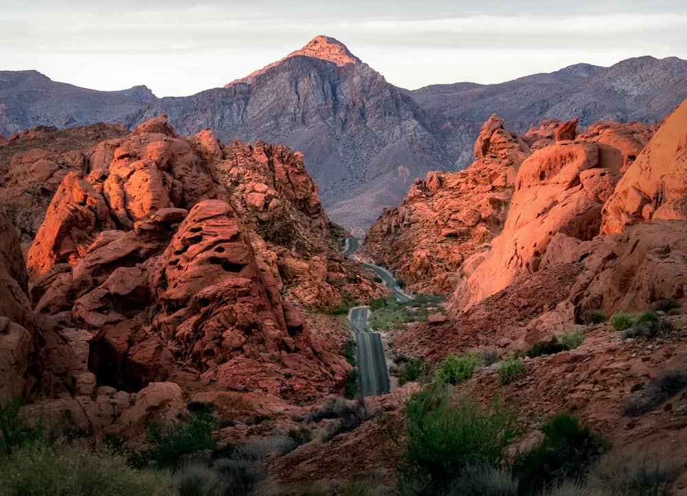 A road runs through the red rocks in Nevada, revolutionizing the visitor experience with a cloud-based reservation system for Nevada State Parks.