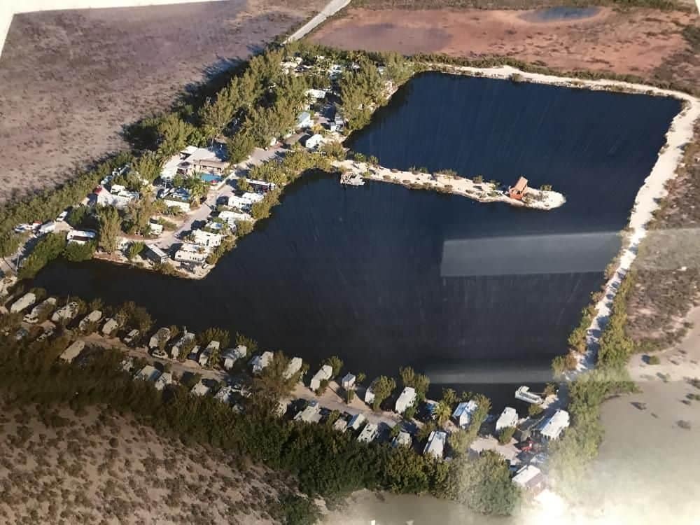 An aerial view of the First Campground near a body of water in Florida.