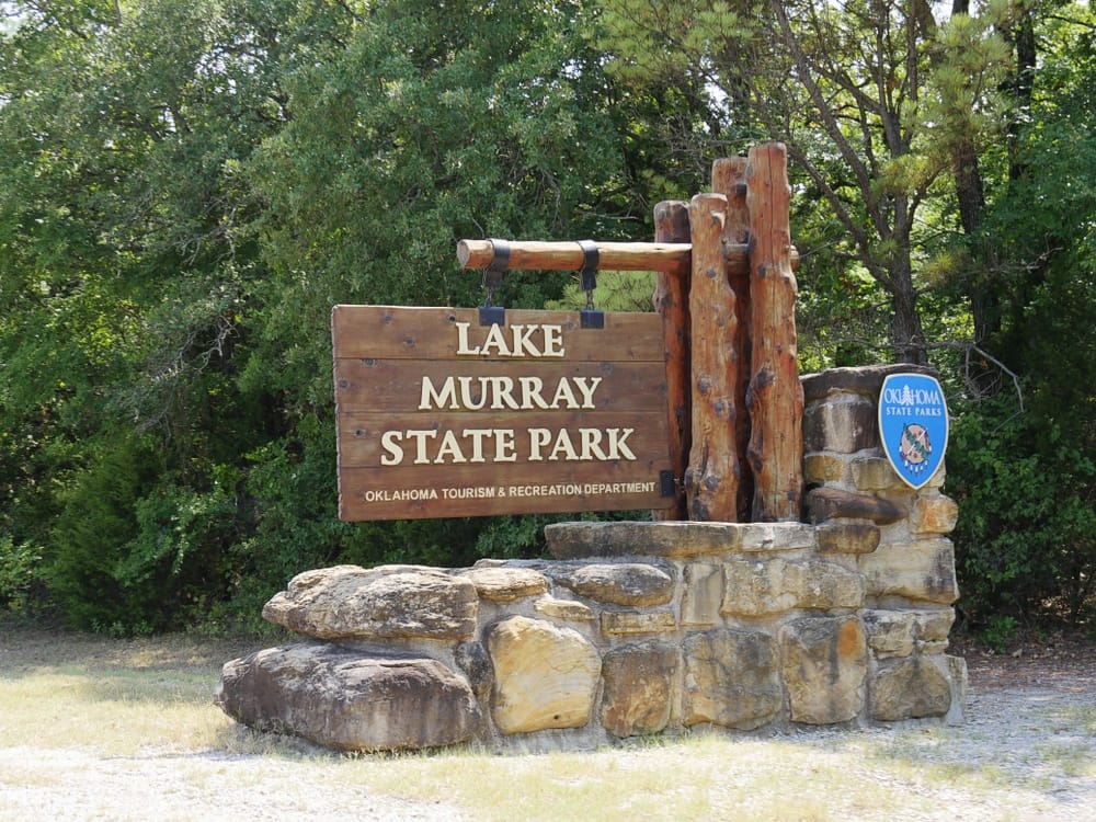 Lake Murray State Park in Oklahoma offers camping opportunities amidst the stunning natural beauty. Despite the ongoing pandemic, visitors can still revel in the serene atmosphere while practicing necessary safety precautions.
