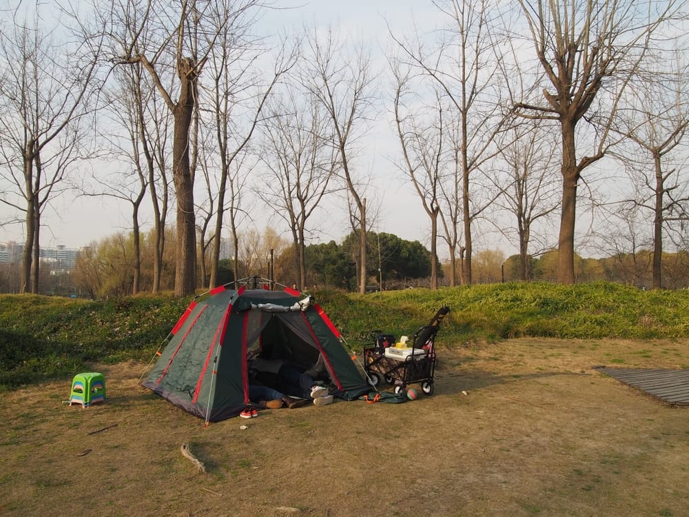 Amidst the Camping Boom, a tent is set up in one of Shanghai City Parks.