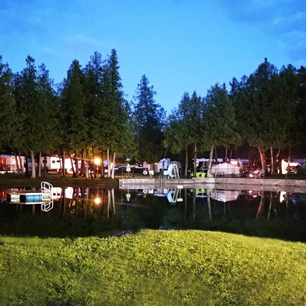 Harmony Resorts in Ottawa East experiences a rate increase at their serene RV park on a picturesque lake, attracting visitors for peaceful nights amidst nature's beauty.