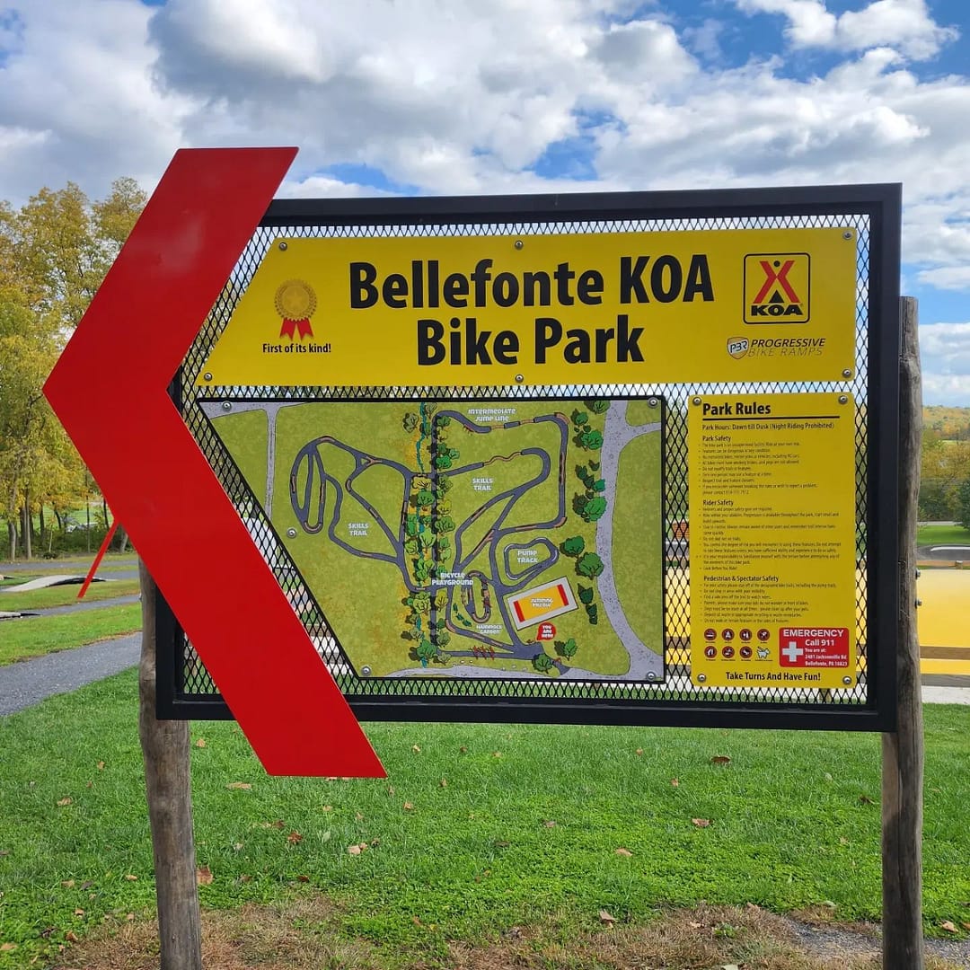 State College KOA Holiday bike park sign in Bellefonte.