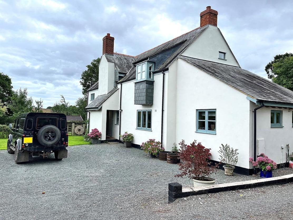 A thriving camping business located in the Quantock Hills AONB recently acquired a white house, with a jeep parked conveniently in front of it.