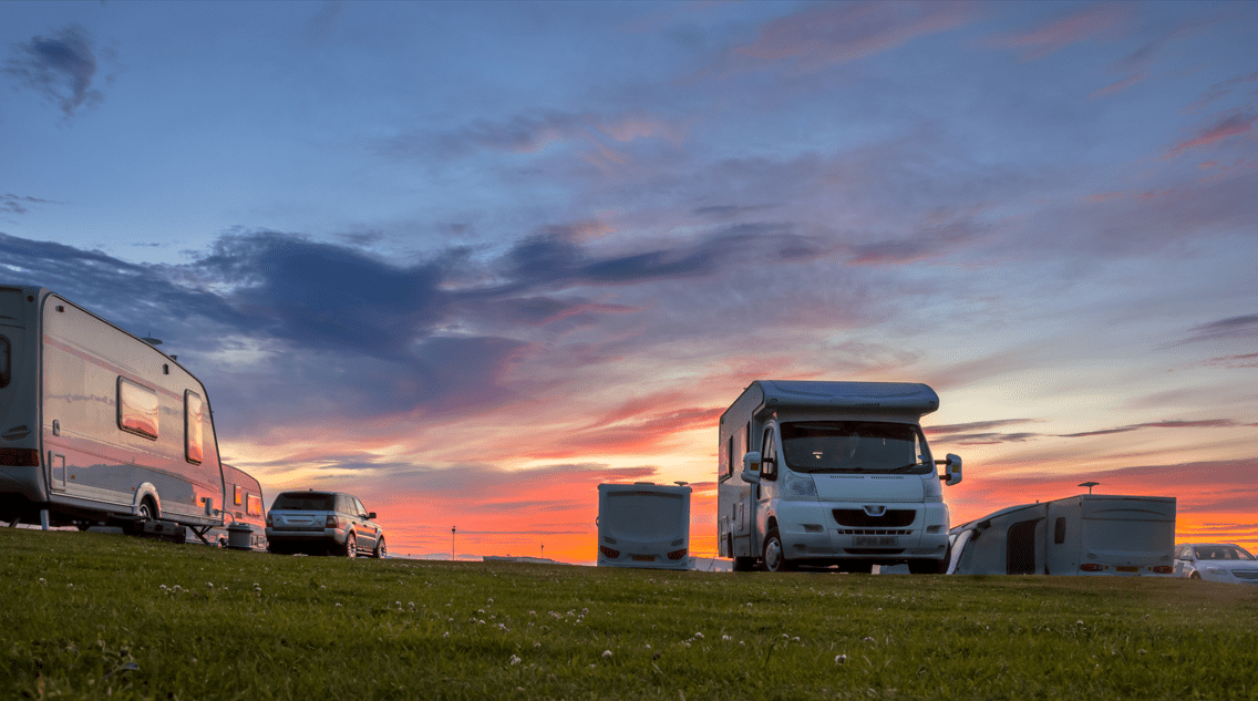 A group of rvs parked in a field during the 31st Annual Northwest Michigan RV and Camping Show kickoff weekend.
