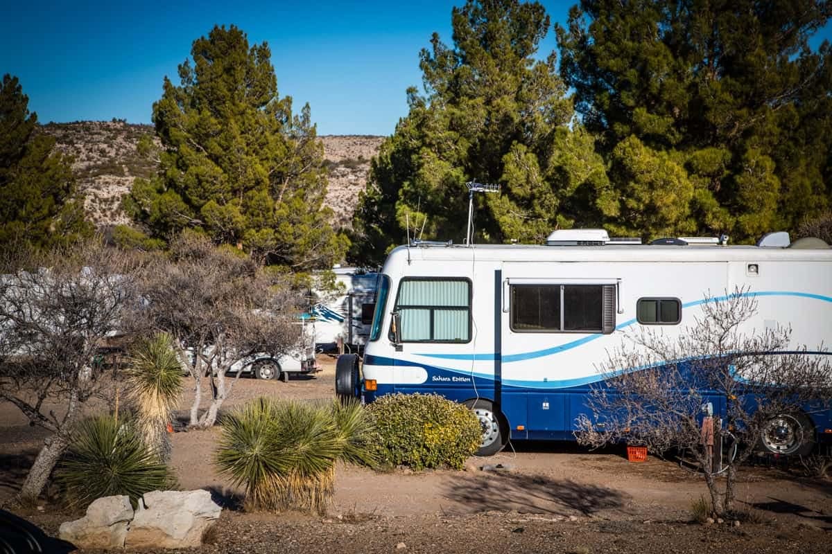 A blue and white rv parked at Verde Valley RV Resort, the 2022 Large Park of the Year.