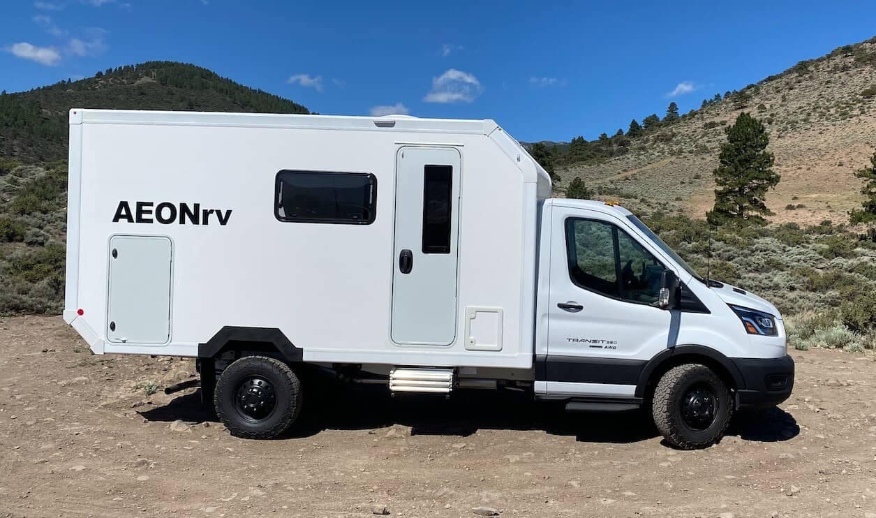 The AEONrv is parked on a dirt road.