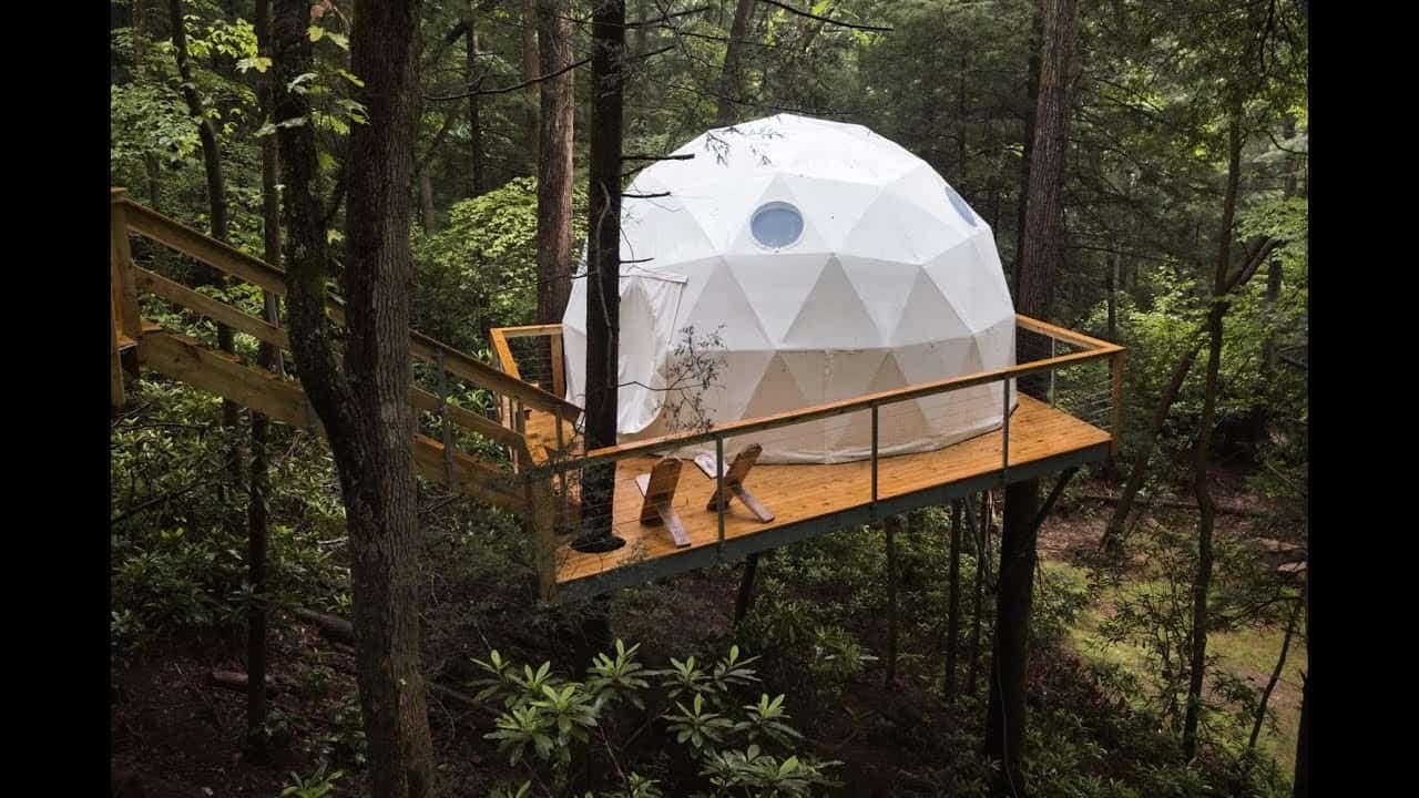 A 20 ft tree house in the middle of the woods.