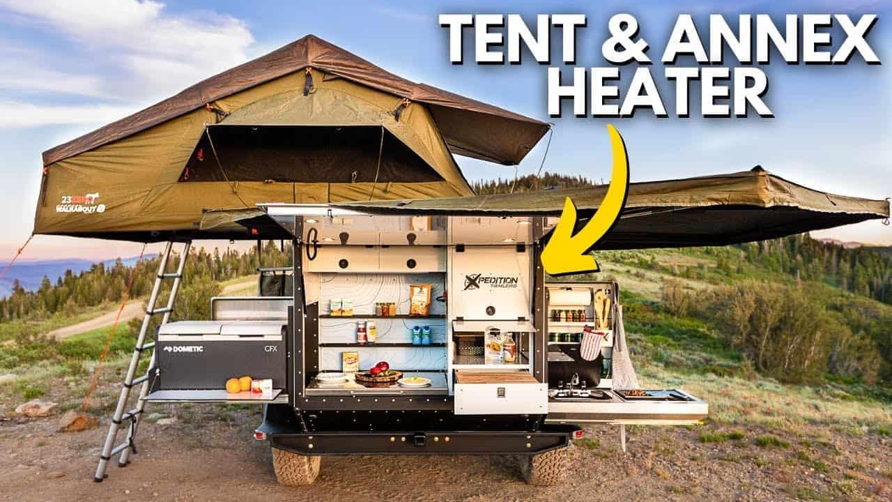 An off-road camper with a tent and an annexe heater.