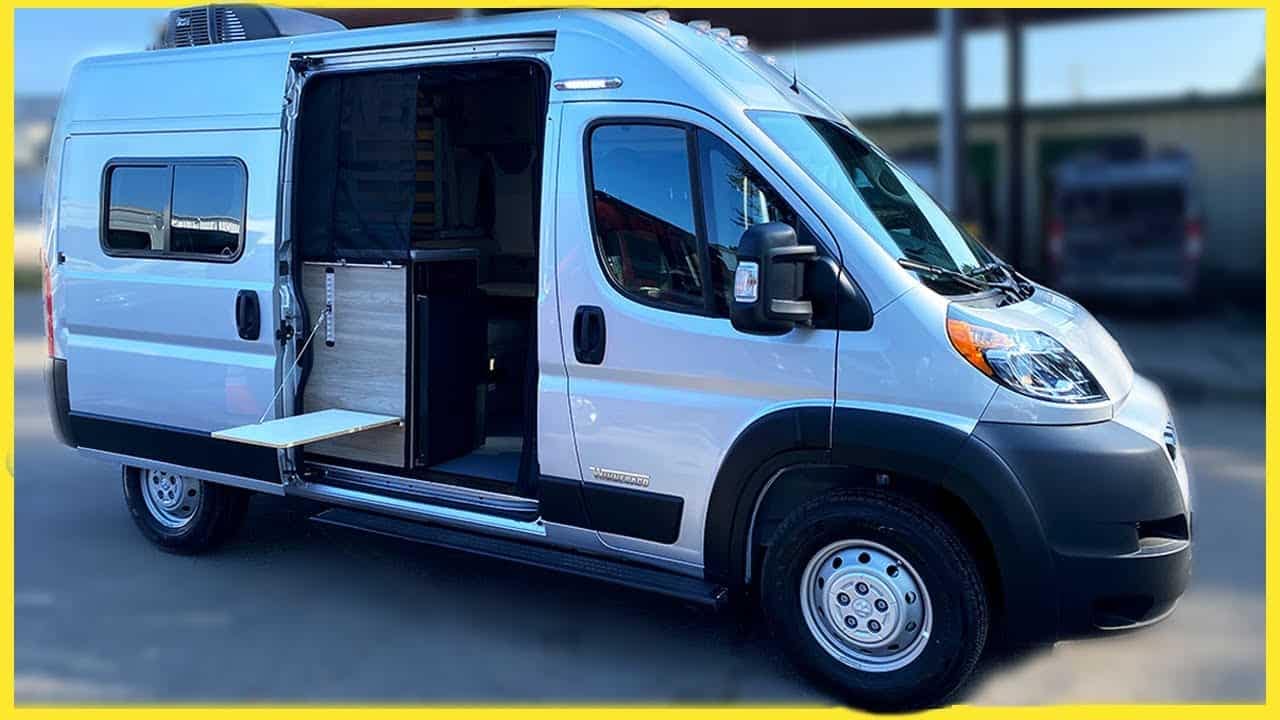 The 2022 Solis Pocket, the smallest Winnebago campervan, featuring a silver exterior and an open door.