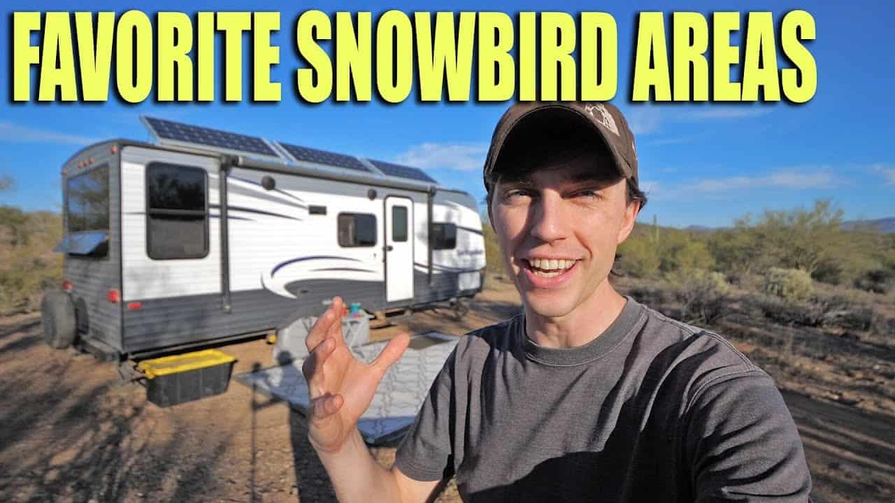 A man standing in front of his favorite snowbird area, RV.