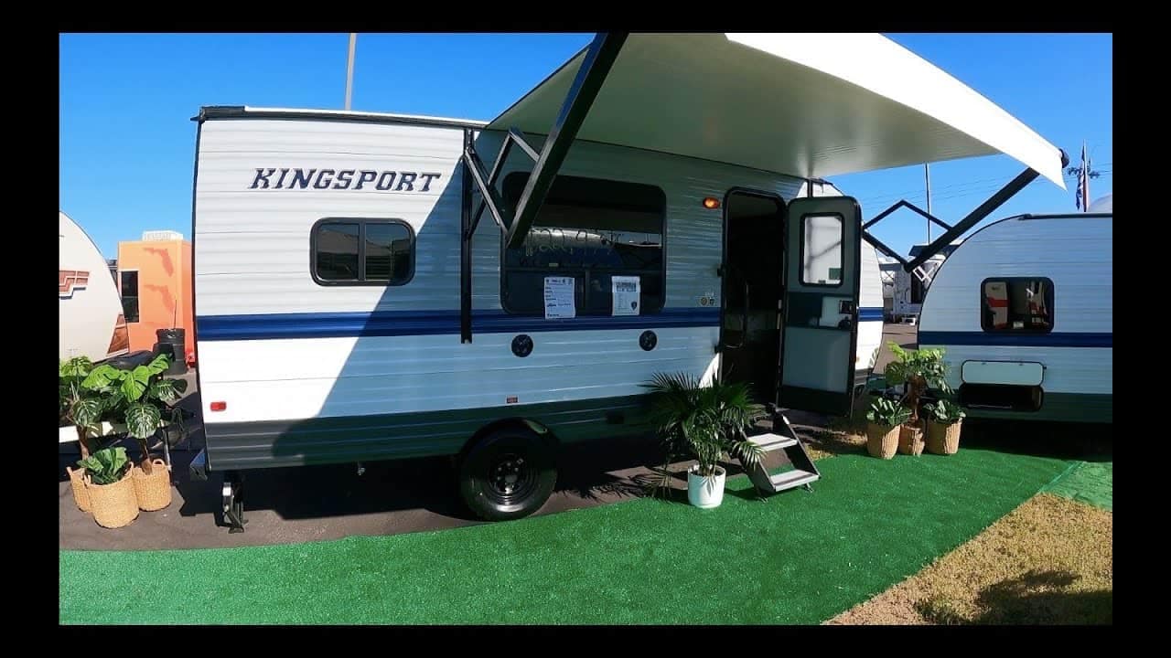 The 2022 Gulfstream Kingsport RV is on display at a show.