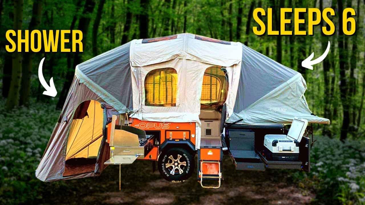 An off-road pop-up camper with a shower in the woods.