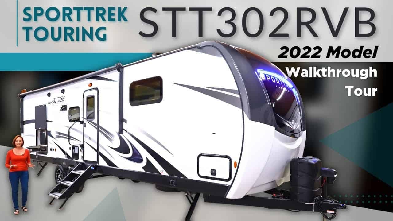 A woman is standing next to a RV with the text SportTrek Touring STT302VRB 2022 model walkthrough tour.