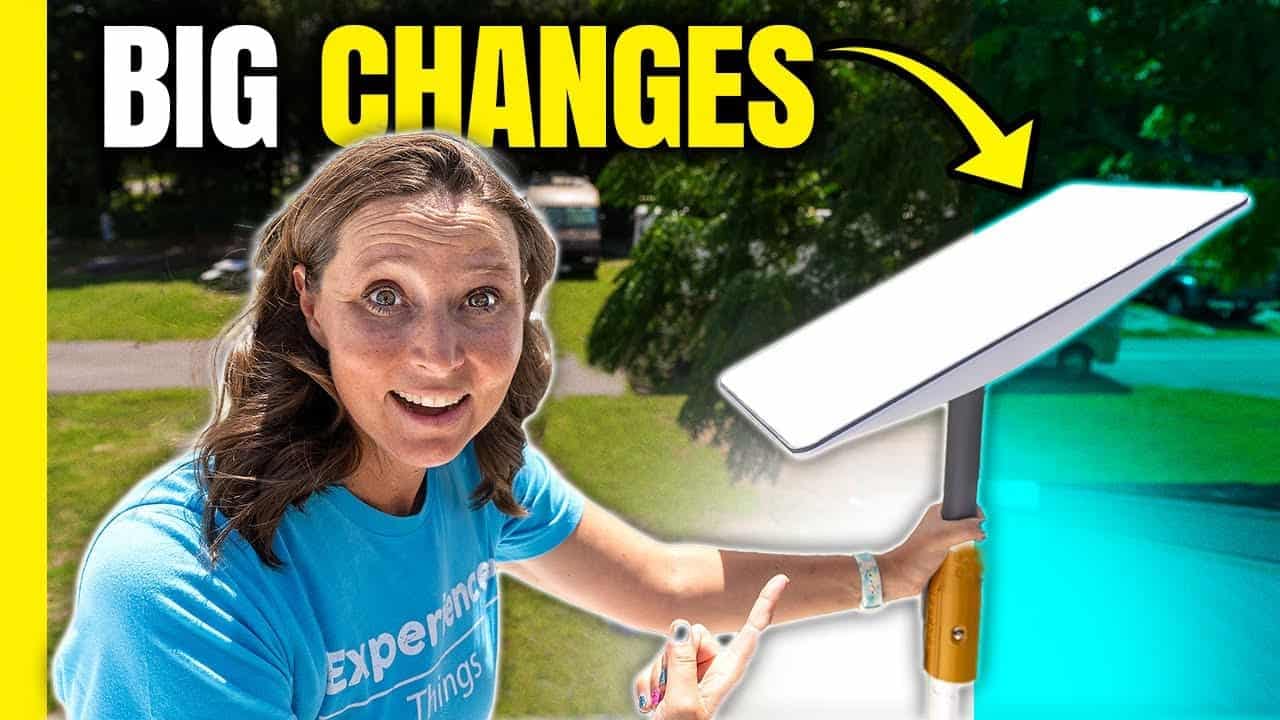 An RVing woman is holding up a sign that says big changes.