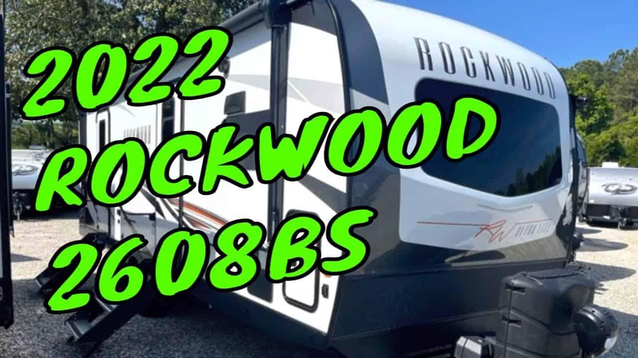 The 2022 Forest River Rockwood Ultra Lite 2608BS RV is parked in a lot, awaiting an RV Tour.