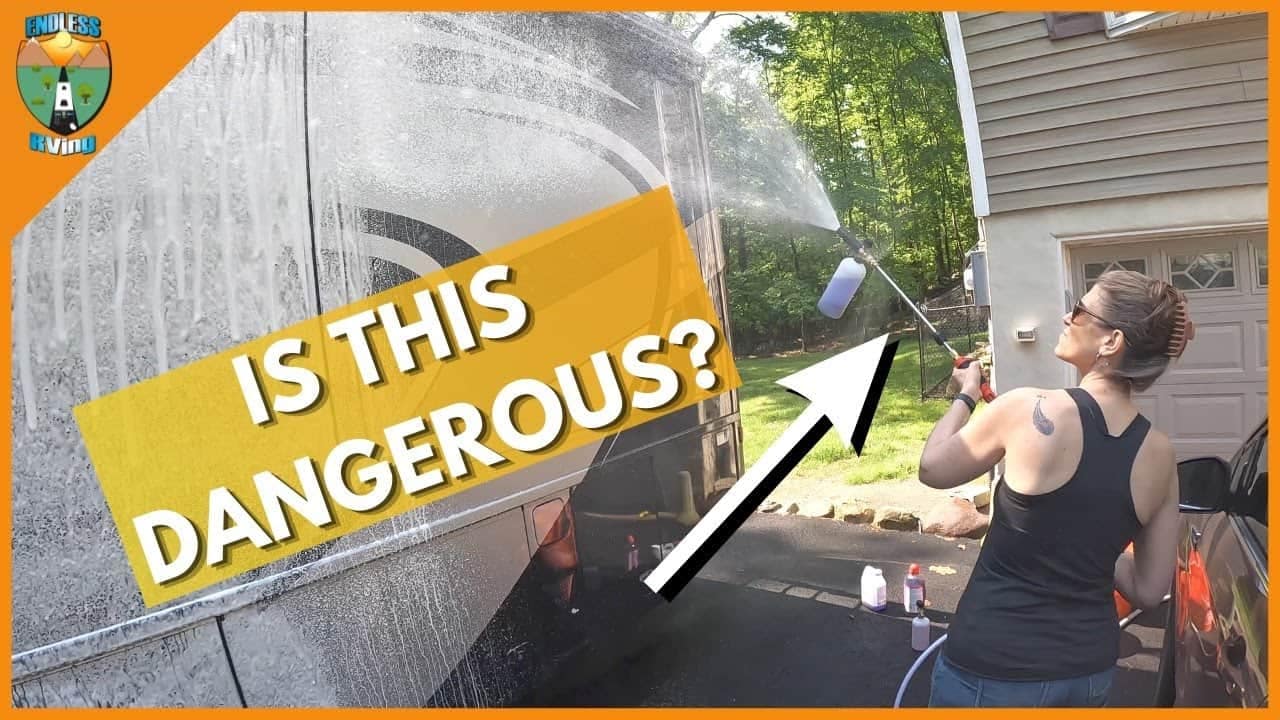 A woman is spraying her RV, making it look like new.