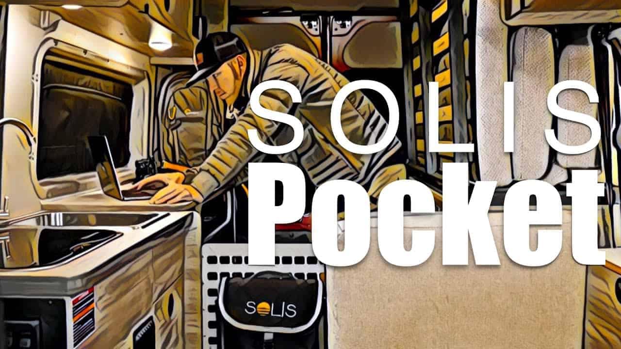 A man is sitting in a 2022 Solis Pocket RV Tour.