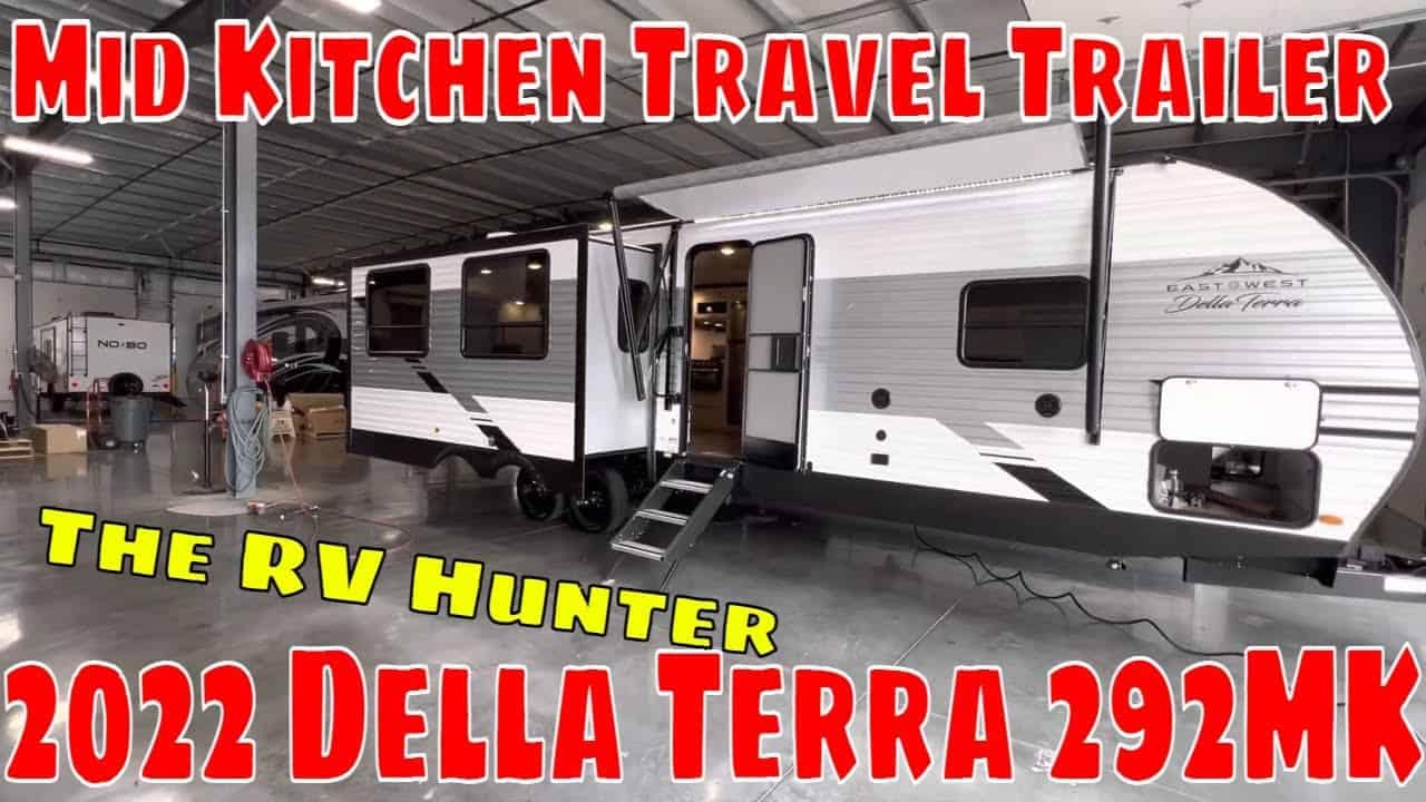The 2022 Della Terra 292MK RV Tour features a mid kitchen in the van hunter travel trailer.