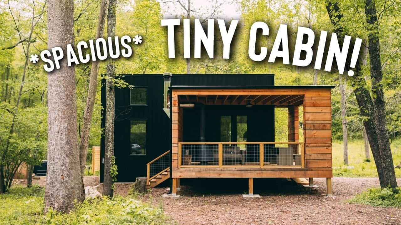 A spooky tiny cabin nestled amidst the woods with a hidden loft.