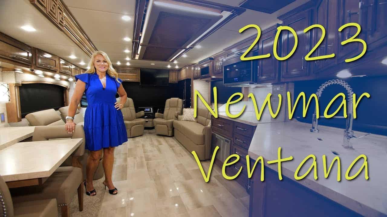 A woman standing in front of a 2023 Newmar Ventana RV for an RV Tour.