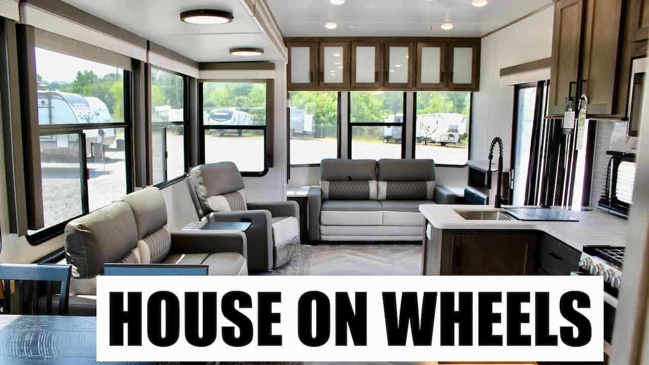 A 2022 Forest River Wildwood Lodge, a park model RV with the words house on wheels.
