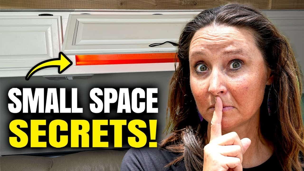 A woman in an RV utilizing small space secrets to maximize her living area.