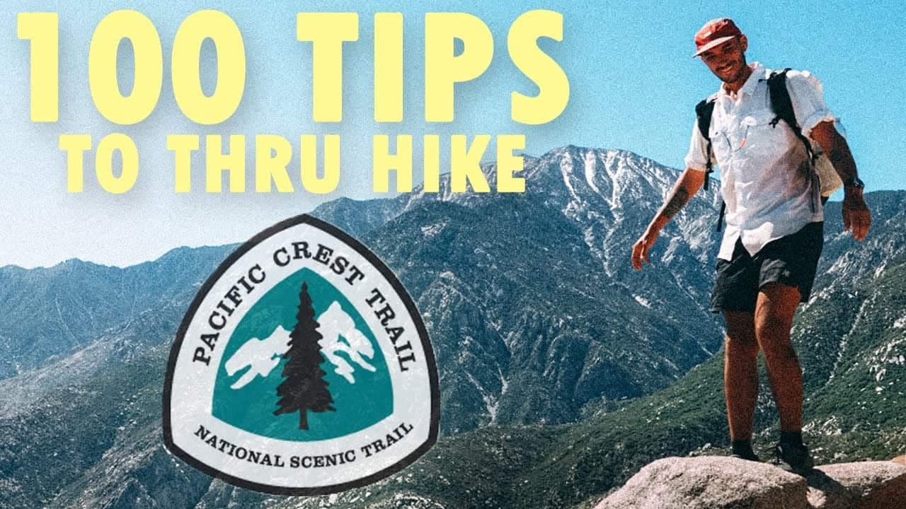 A man on top of a Pacific Crest Trail mountain with the words 100 tips to thru-hike.