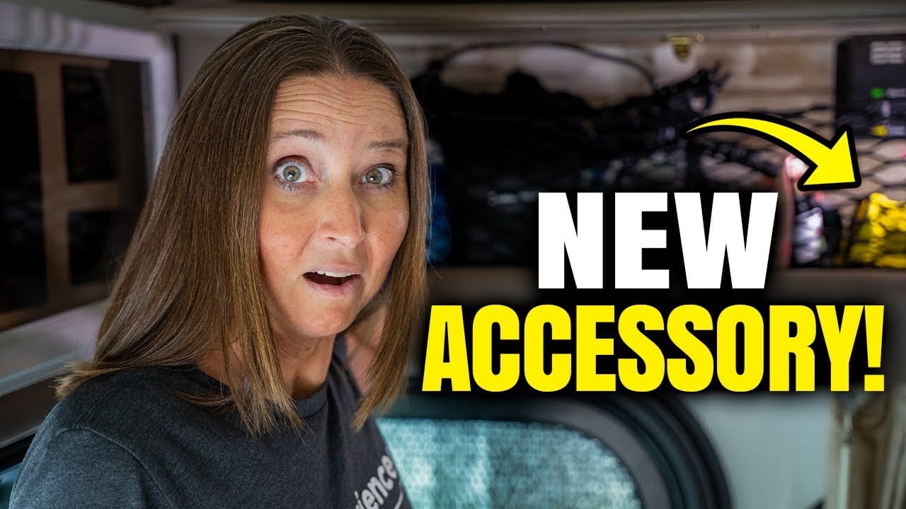 A woman is exploring affordable RV organization options, specifically checking out Obeco Storage Nets for her new accessory.
