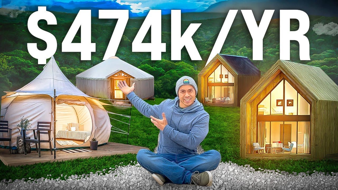 A man sitting in front of a yurt, engaged in outdoor hospitality ventures.