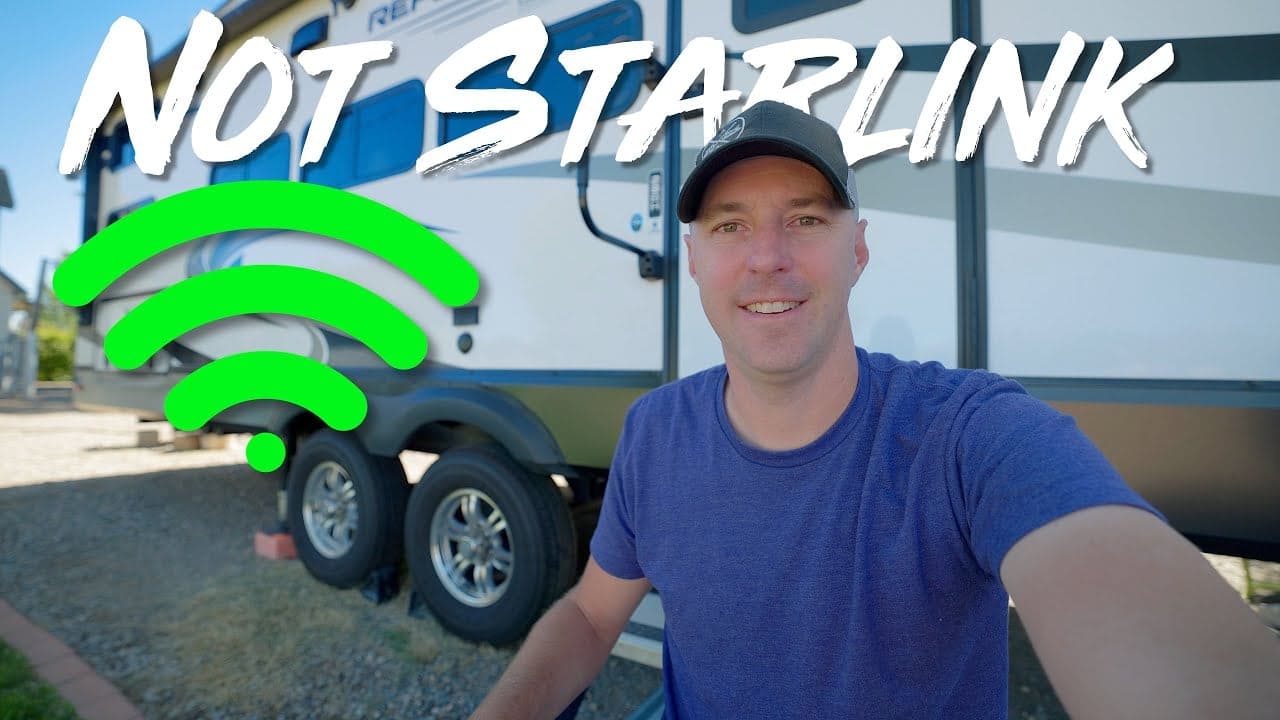 A man is taking a picture of his affordable RV Internet solution with the words not starlink.