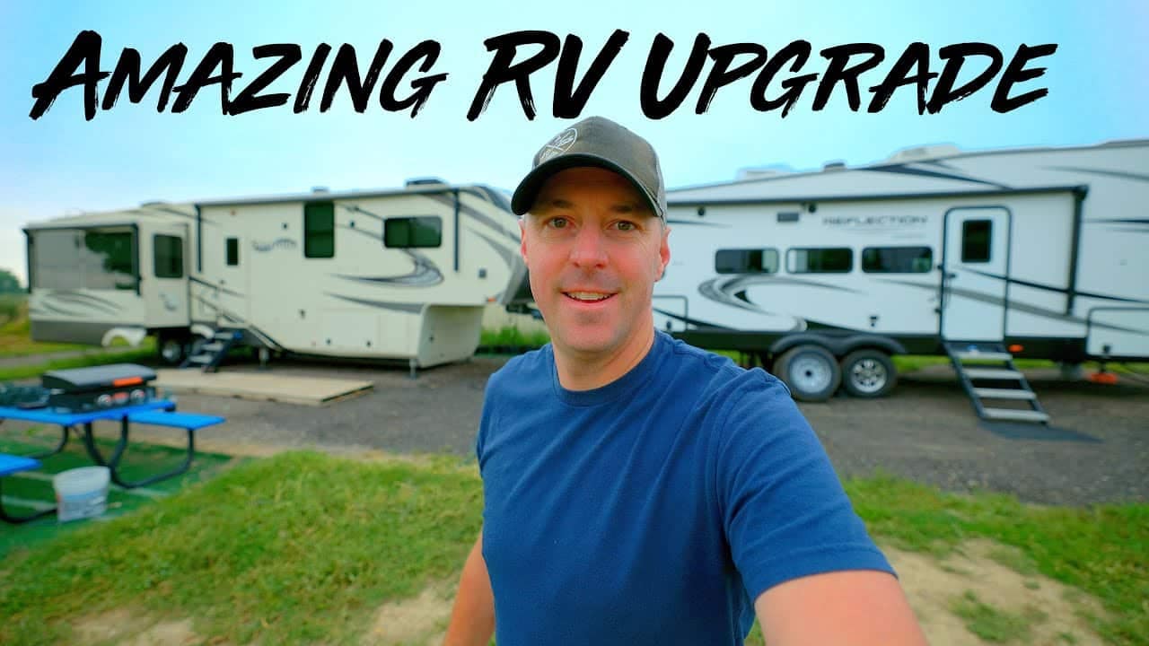 An RV enthusiast captures a selfie before an incredible and Boar Wheels-equipped RV, showcasing the amazing upgrade.