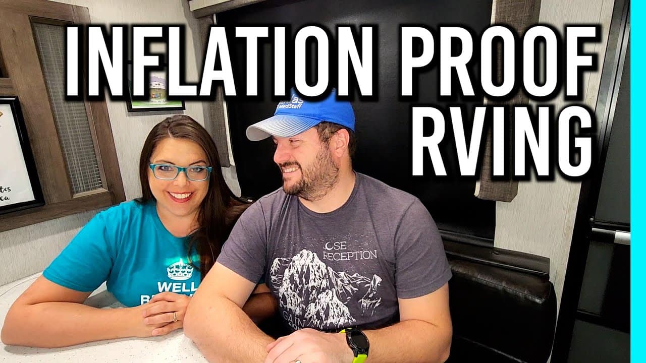 Two people sitting at a table, unlocking the secrets of inflation-proof RVing.