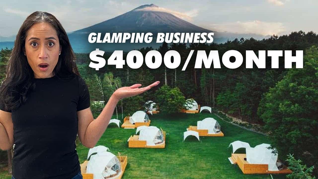 A woman is standing in front of a group of tents, showcasing her glamping business. With affordable rates starting at $400 a month, she is ready to kickstart her startup and conquer the market