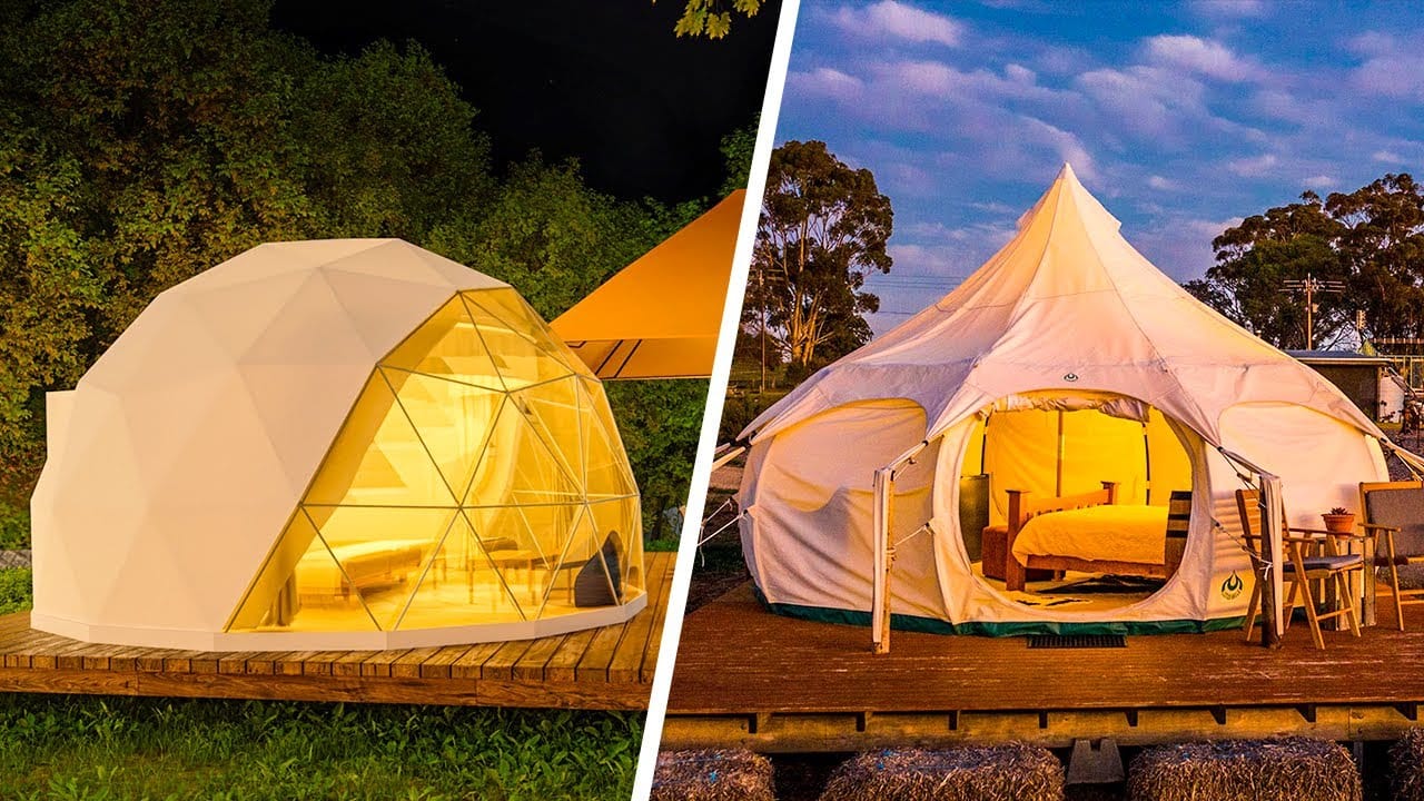 Two luxury tents on a wooden deck, offering glamping style.