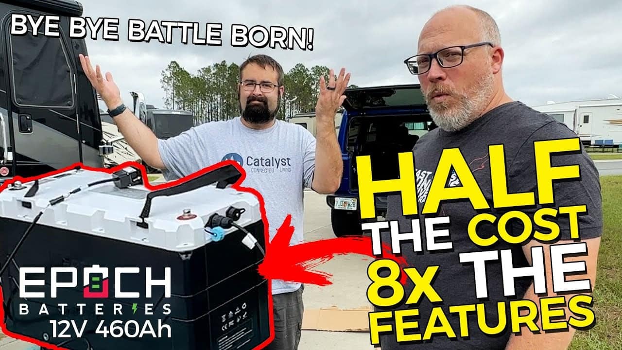 Two men standing next to a truck with the text half the cost battle born. The truck is equipped with Epoch's 460Ah Lithium Battery, providing RV Power.