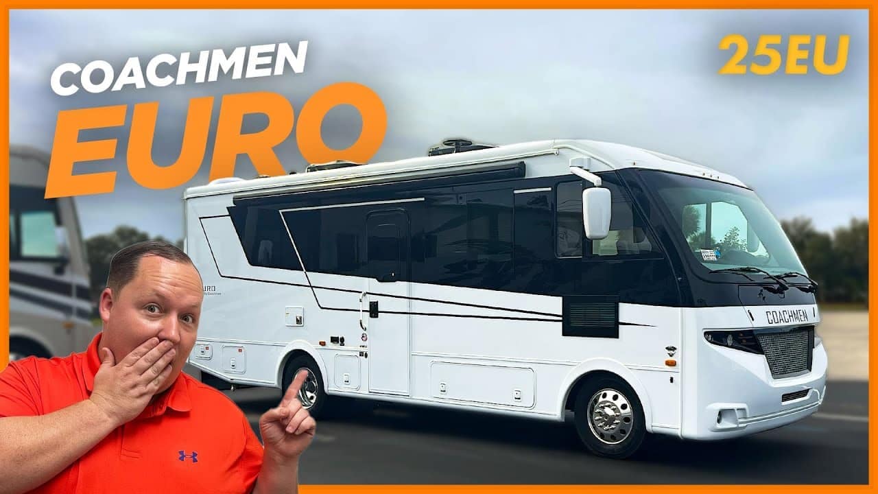 A man is standing next to a Coachmen Euro 25EU motorhome, which is making its world debut.