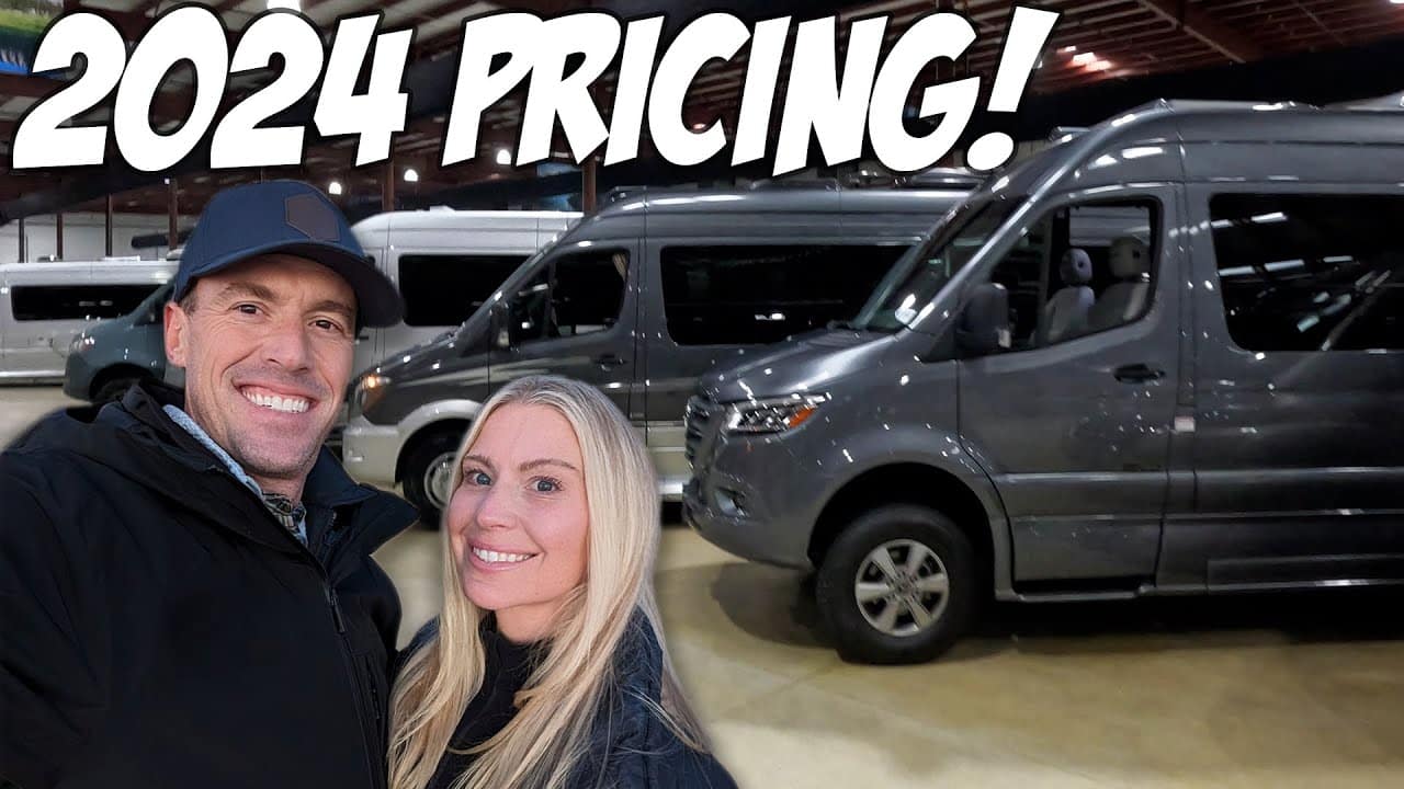 Two people are taking a selfie in front of a 2024 Class B RV with the words "2020 pricing".