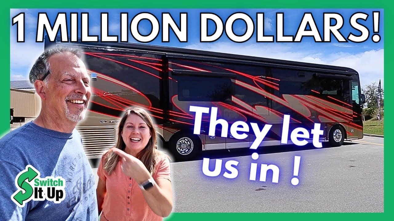 A man and a woman smiling in front of a large luxury RV with red and black stripes, text overlay reads "1 million dollars! Auto Draft let us in!