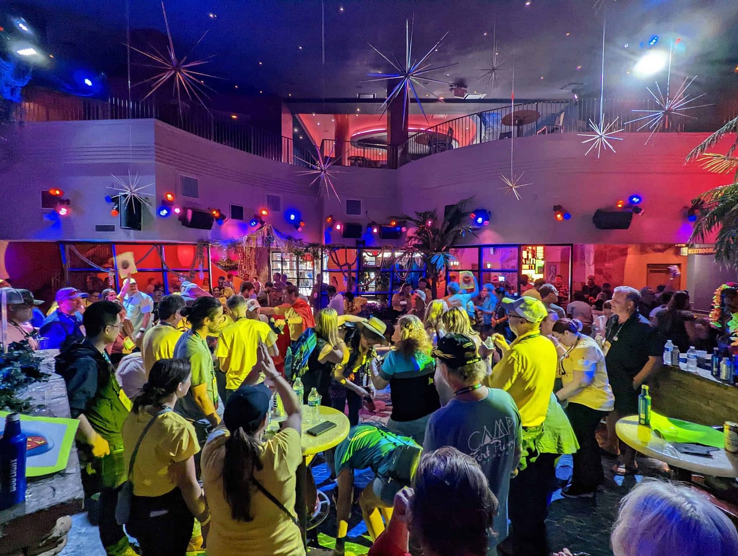 KOA Convention First-Timers participate in a Special Networking Reception, surrounded by mesmerizing neon lights.