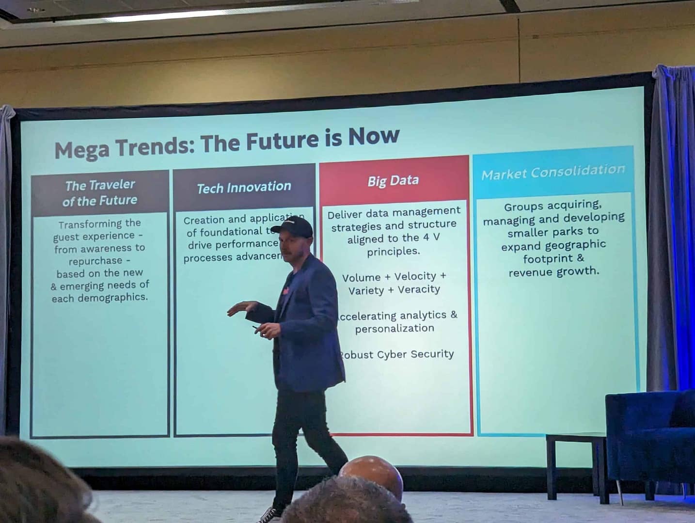 A man giving a presentation on Megatrends, showcasing how the future is now for OHCE2023 attendees.