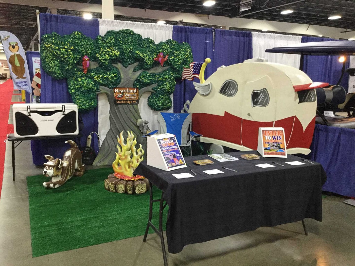 A display of a camper at the Detroit RV Camping Show.