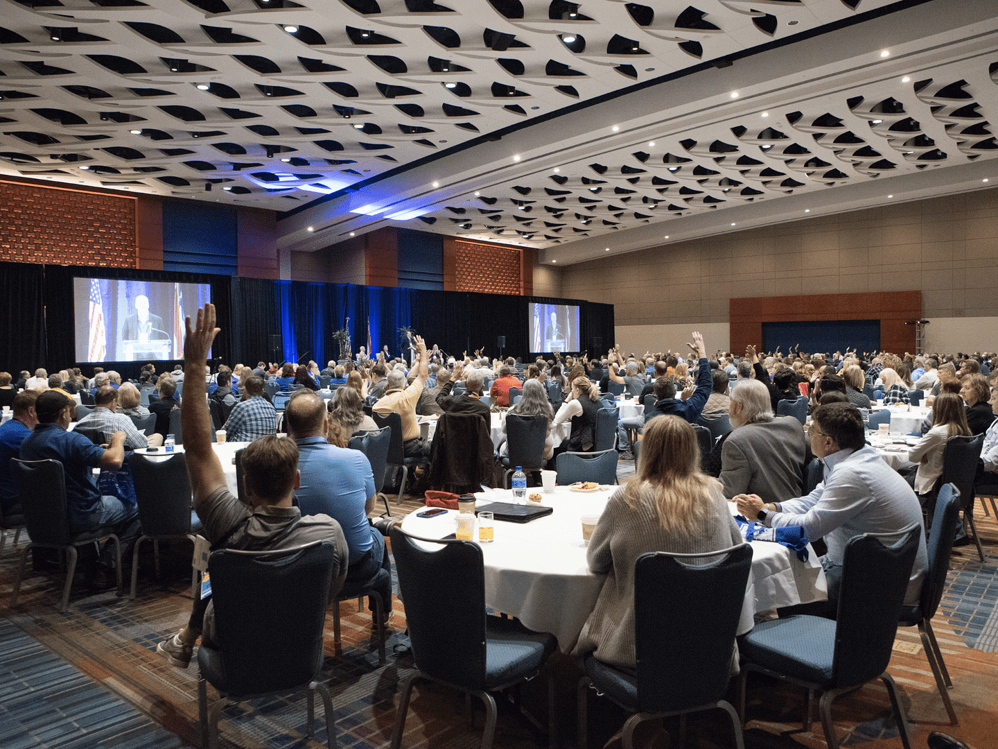 Industry Leaders gather at OHCE 2023, filling a large conference room with people.
