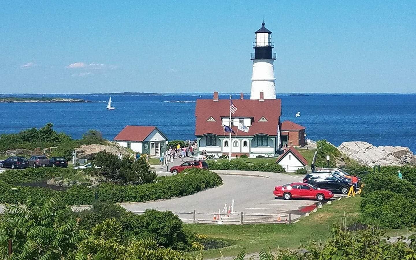 A lighthouse overlooks the ocean.
