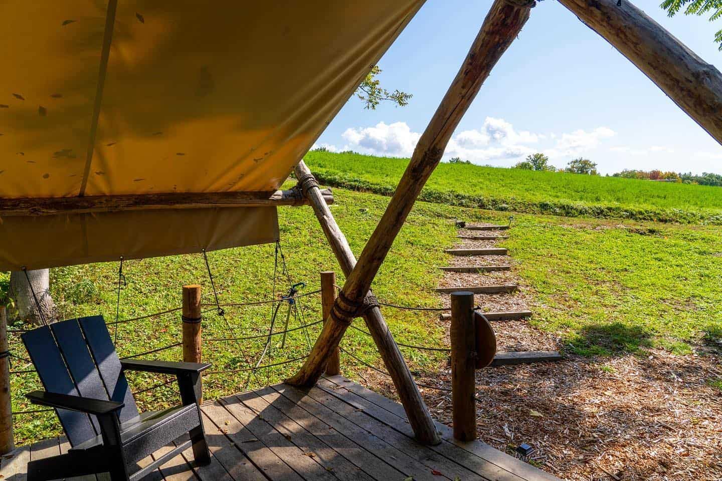 Enjoy the stunning view from the deck of your tepee tent at Liberty Farms, where you can truly STAY in nature.