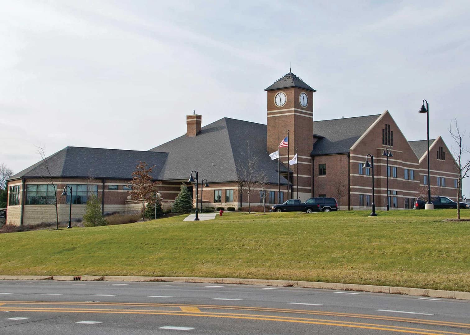 The picturesque Fox Bluff Resort boasts a stunning large brick building featuring a charming clock tower.