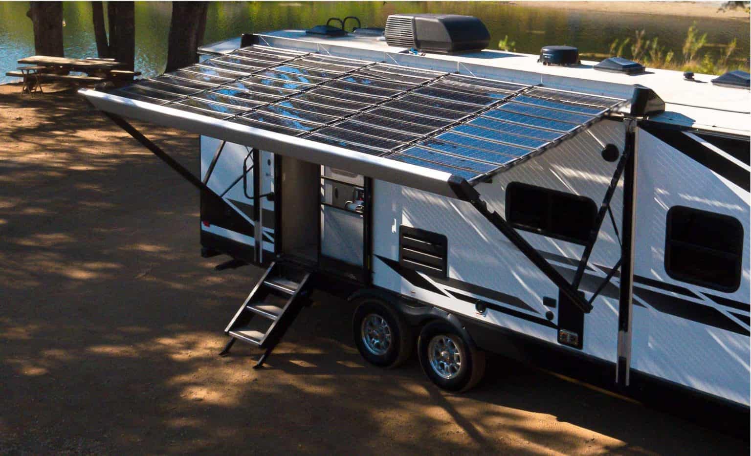 An RV with an Xponent Power retractable 1.2 kW solar awning on the roof.