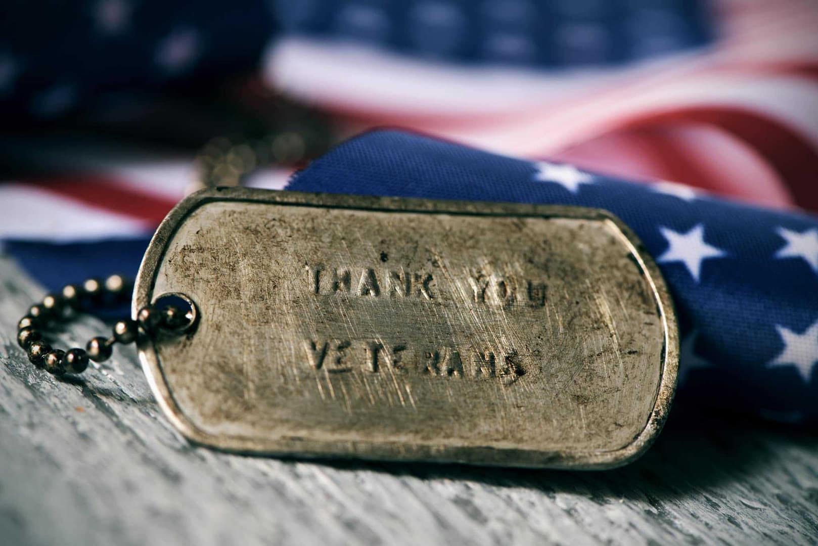 A dog tag featuring the words "thank you veterans" - perfect for a veteran living in an RV.